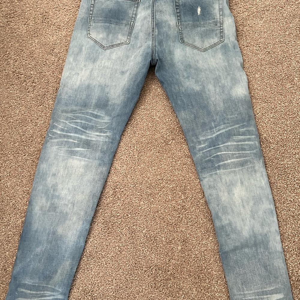 AMIRI Light Blue Skinny Jeans for Men